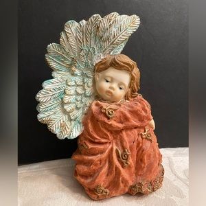 SEATED RESIN ANGEL DRESSED IN BURNT ORANGE GOWN GOLD HIGHLIGHTS ON DRESS & WINGS